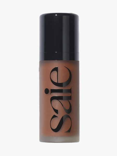Saie Dew Bronze Liquid Bronzer vial of liquid bronzer with black cap on light gray background