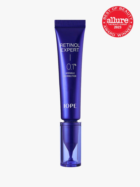 Iope Retinol Expert 0.1% blue tube on light gray background with red 2023 Allure Best of Beauty Award winner seal